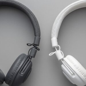 white and black wired stereo headphones on gray ba 2023 11 27 05 22 10 utc (2)